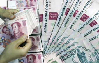 Юань и рубль вместо доллара. Американцы со страхом гадают, чем закончится встреча Банка России и Народного банка Китая