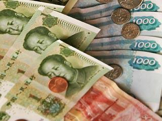 Россия и Китай постепенно отказываются от доллара. Для начала - 50% оборота торговли в юани и рубли
